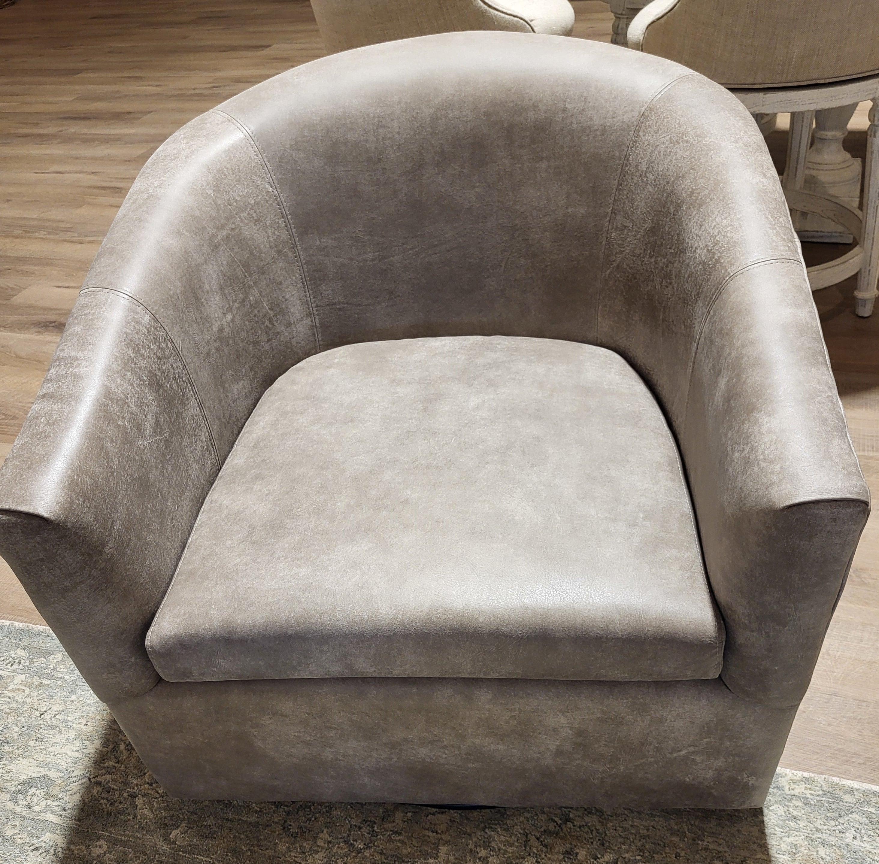Carina Swivel Chair in Leather Caribe Stone (2 in stock)